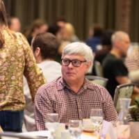 people talking at luncheon table photo 4